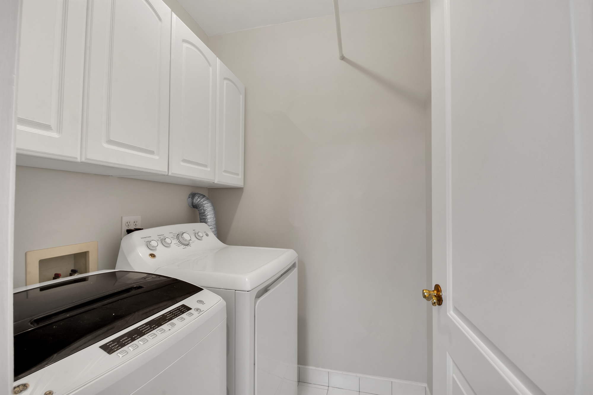 963 Kent Avenue, Unit D3 Brooklyn, NY 11205 - Photo 15 of 16 a utility room with dryer and washer