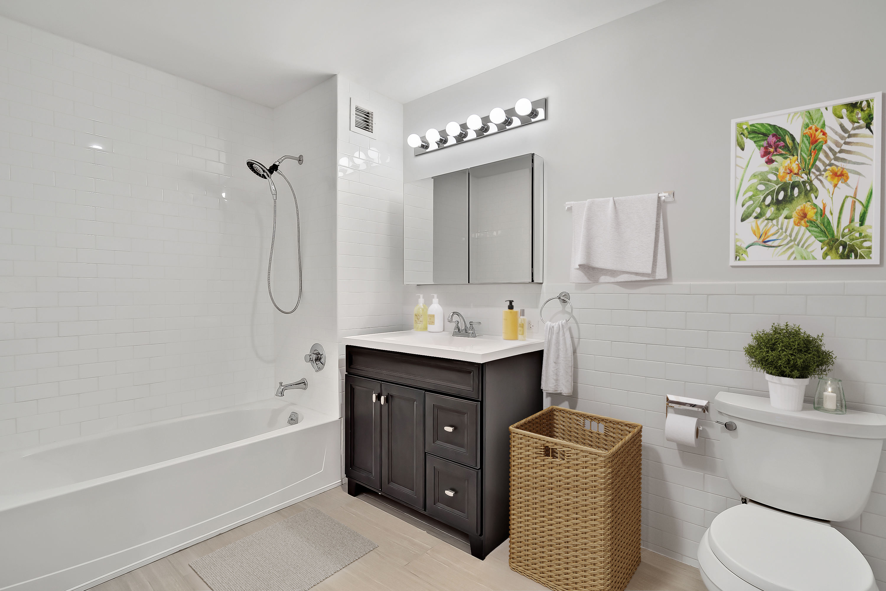 26-20 14th Place, Unit 3C Queens, NY 11102 - Photo 7 of 13 a bathroom with a granite countertop sink a toilet and bathtub