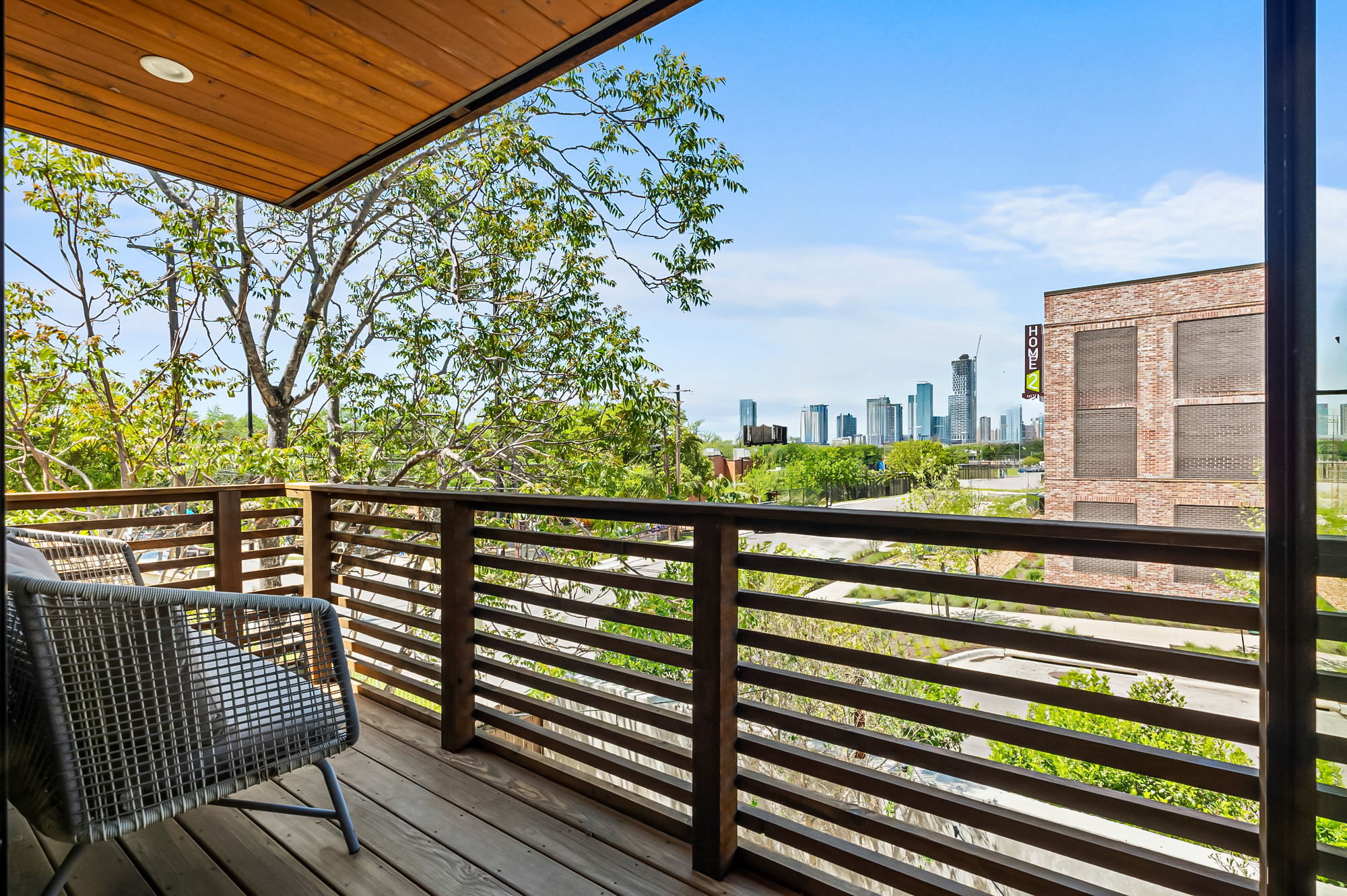 2201 Santa Rosa Street Austin, TX 78702 - Photo 24 of 47 a view of a balcony with wooden floor