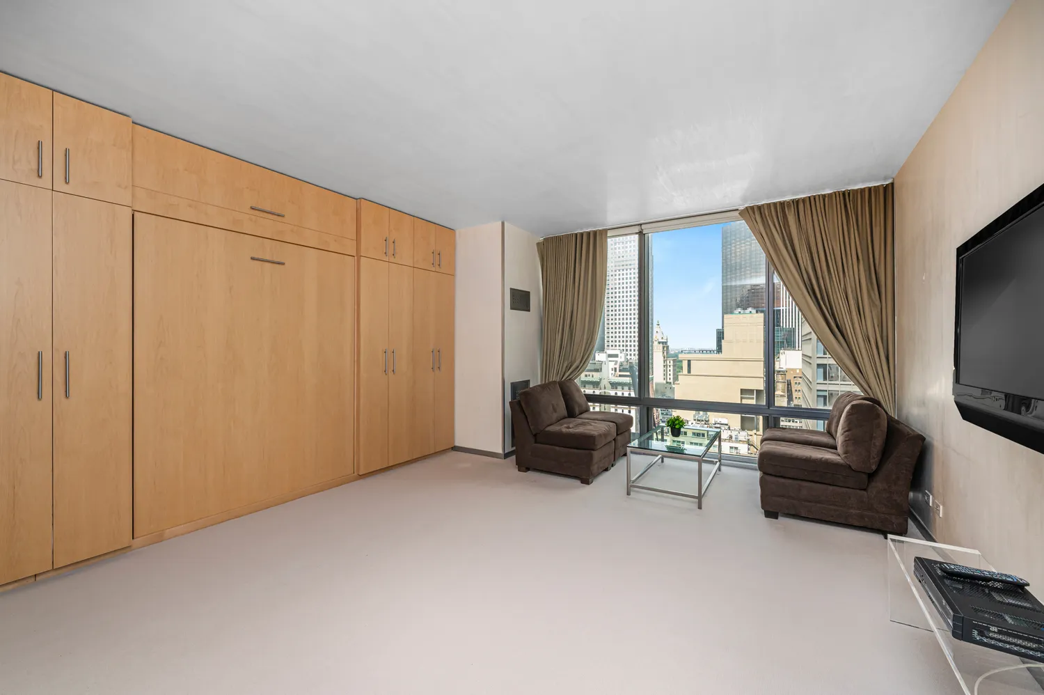 a living room with furniture and a rug