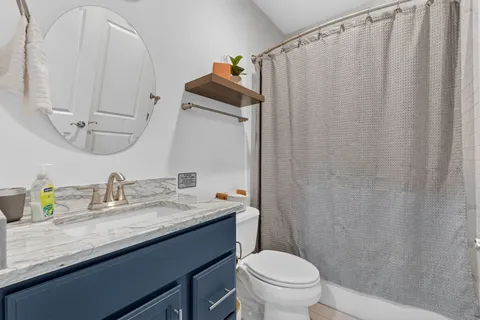 a work room with furniture and a window