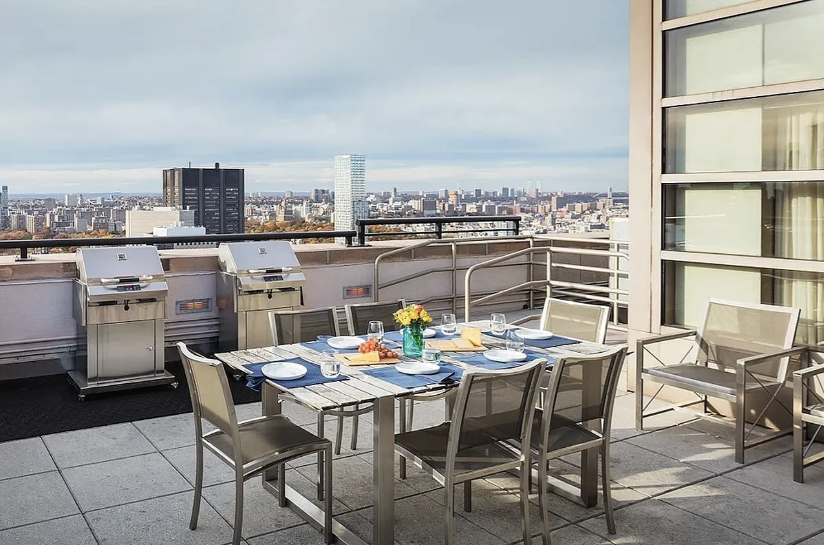 215-217 East 96th Street, Unit 26F Manhattan, NY 10128 - Photo 13 of 19 a view of an outside dining space with furniture