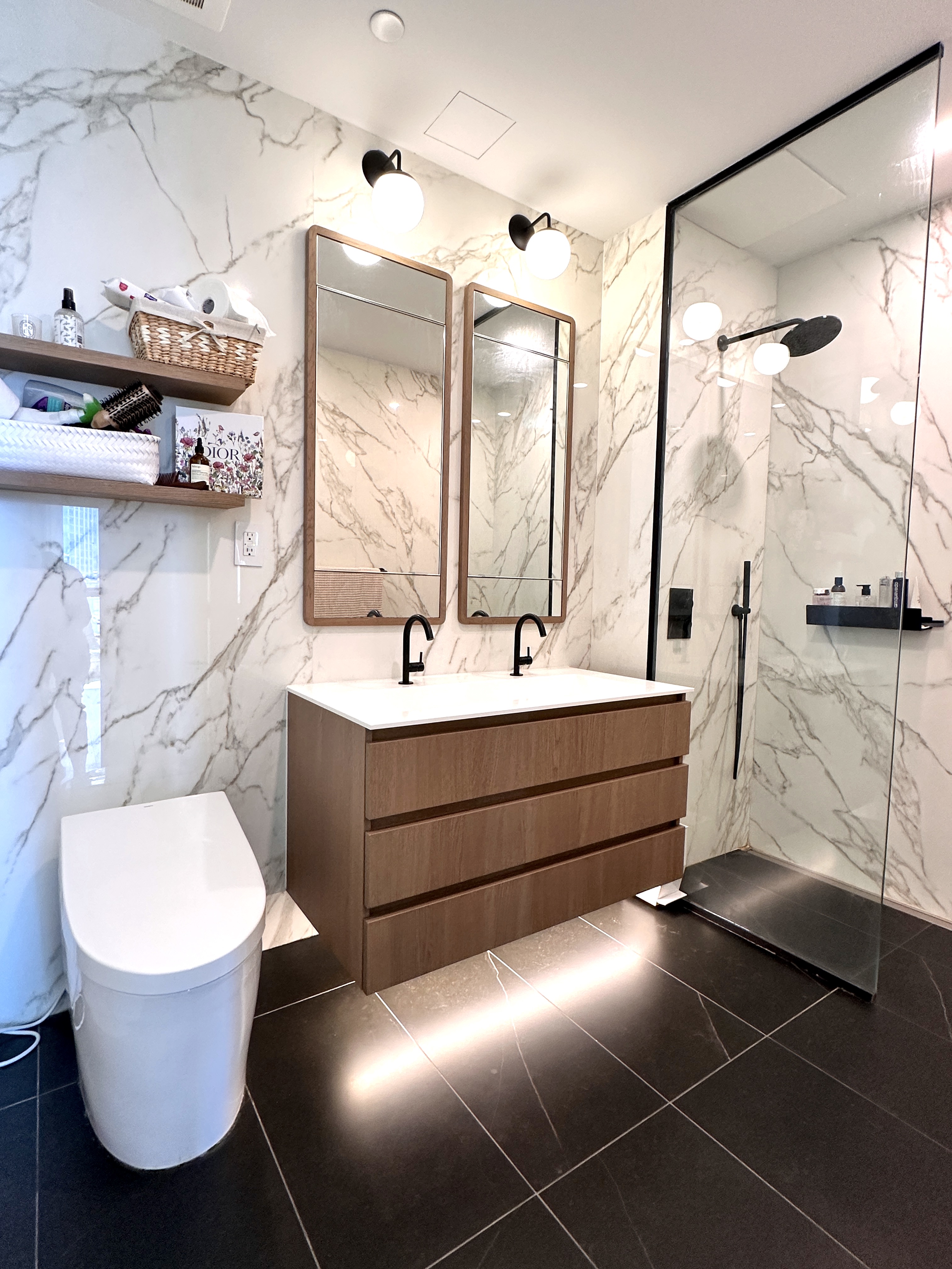 4507 Court Square West, Unit 10E Queens, NY 11101 - Photo 10 of 14 a bathroom with a sink mirror and tub