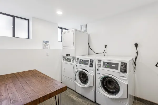 a view of a room with washer and dryer