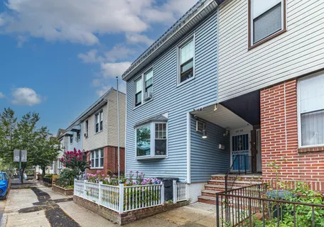 a front view of house along with street