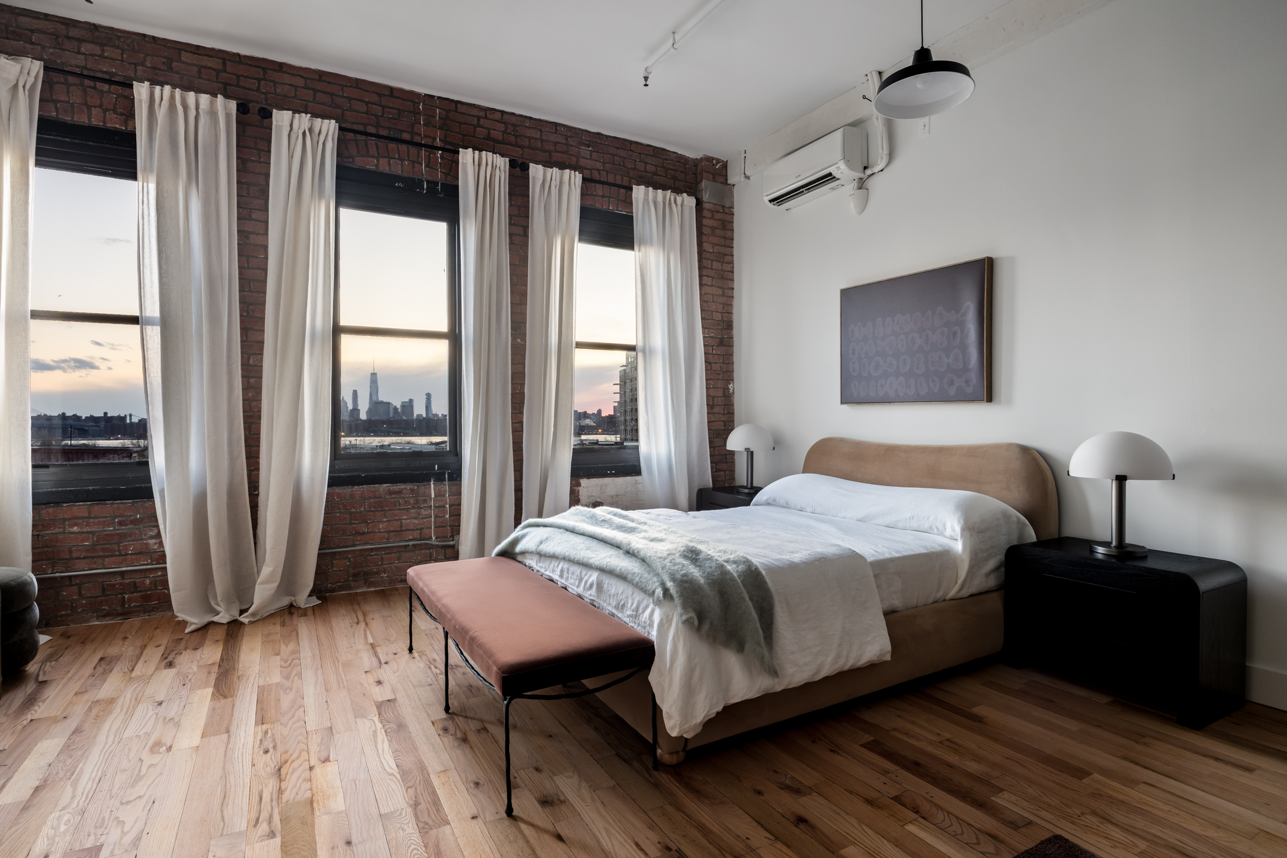 239 Banker Street, Unit 2R Brooklyn, NY 11222 - Photo 7 of 13 a bedroom with a bed and wooden floor