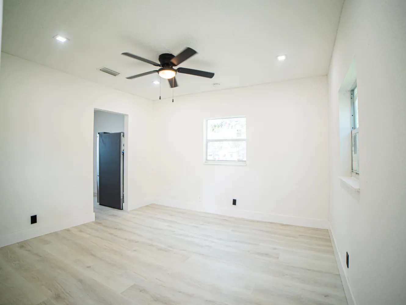 a view of a big room with carpet