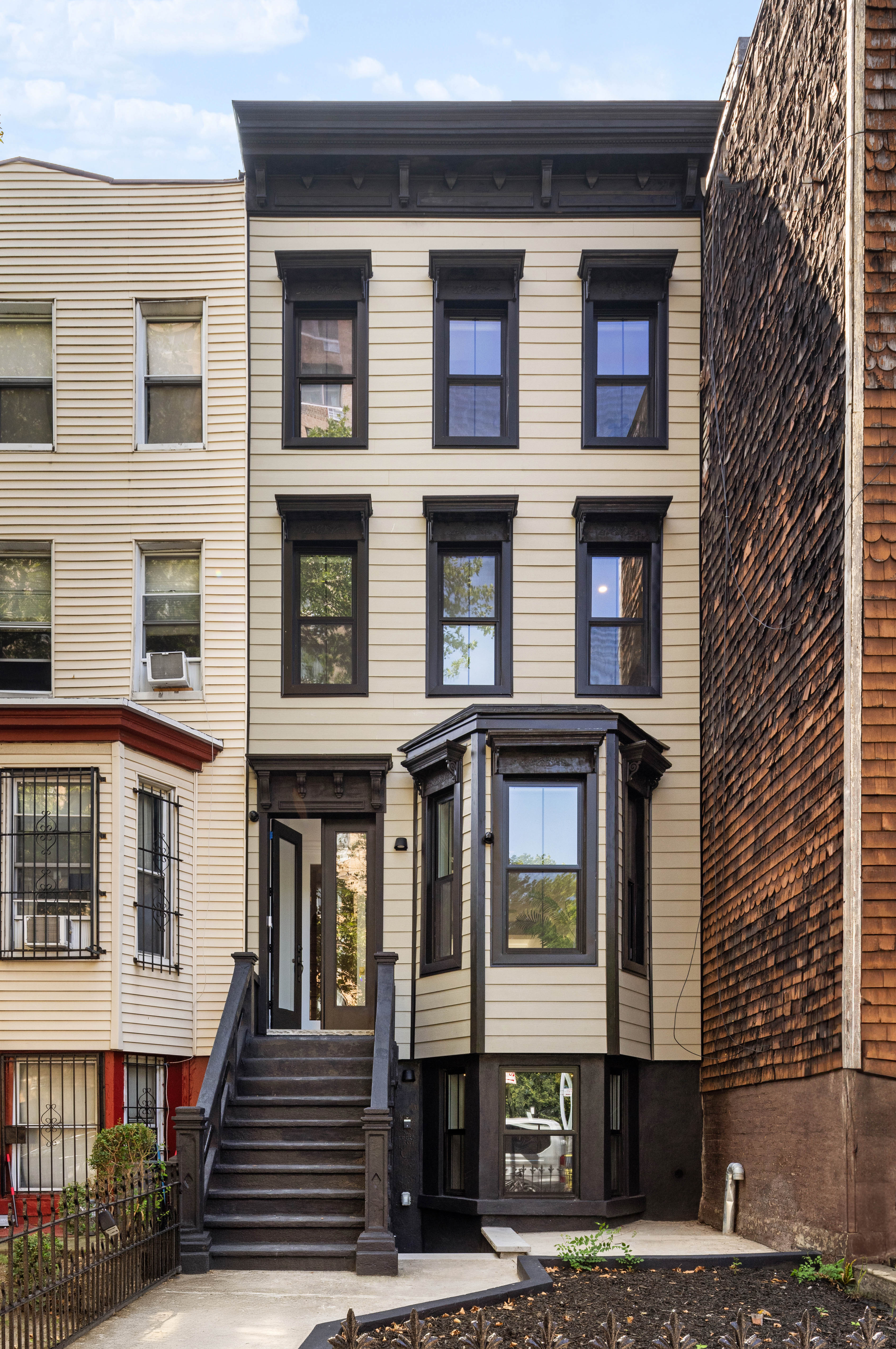 174 Hall Street Brooklyn, NY 11205 - Photo 13 of 14 a front view of a multi story building