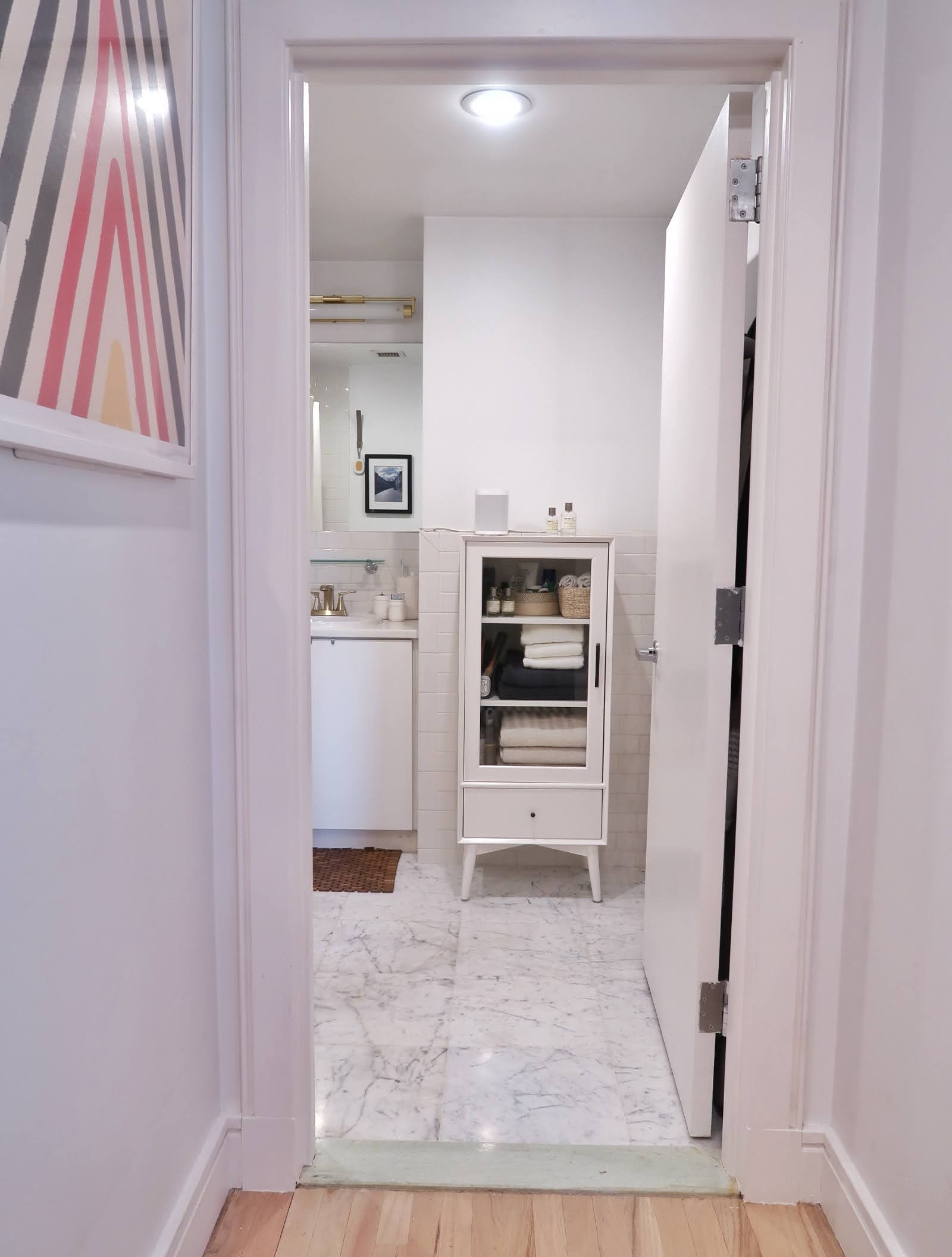 296 East 2nd Street, Unit 4G Manhattan, NY 10009 - Photo 6 of 14 a view of kitchen with furniture and refrigerator