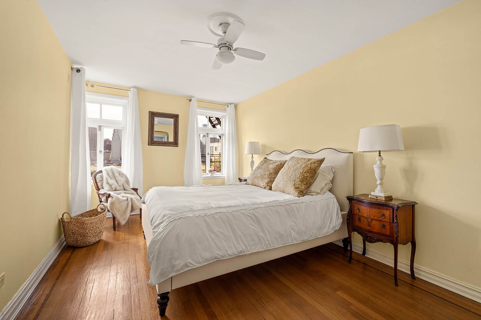 73 Columbia Heights, Unit C1 Brooklyn, NY 11201 - Photo 10 of 14 a bedroom with a bed and a chandelier