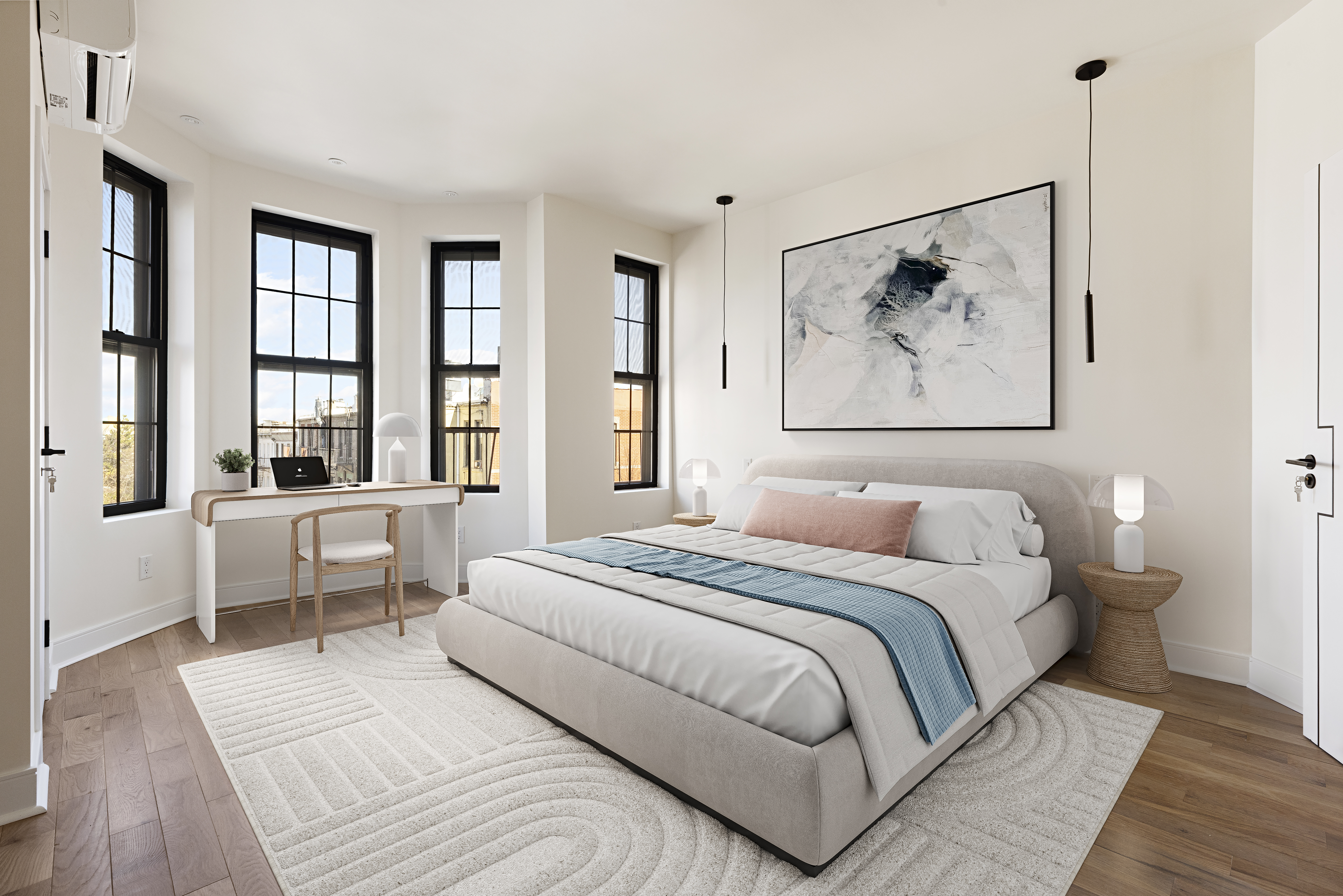 152 North 10th Street, Unit 2A Brooklyn, NY 11249 - Photo 13 of 16 a bedroom with a large bed and a couch