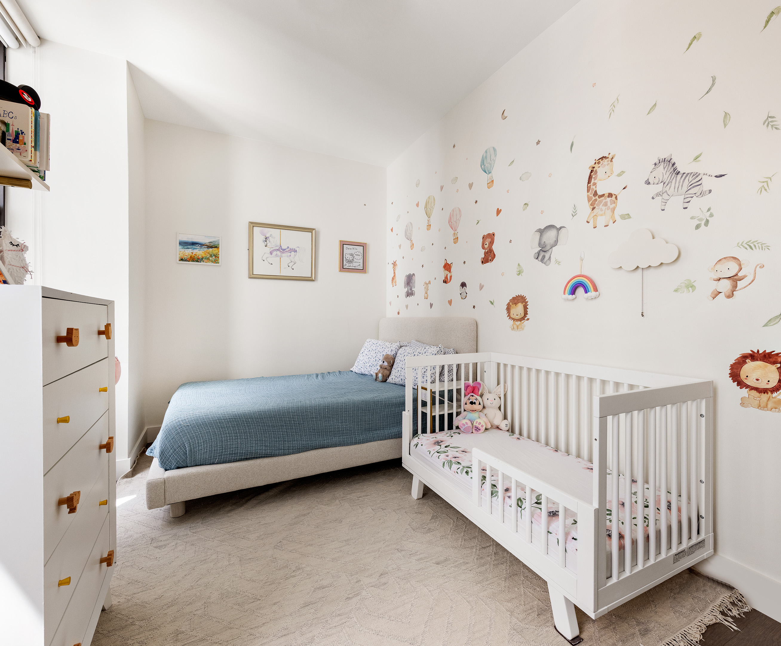 25 Broad Street, Unit 6T Manhattan, NY 10004 - Photo 8 of 13 a bedroom with a bed and a baby crib