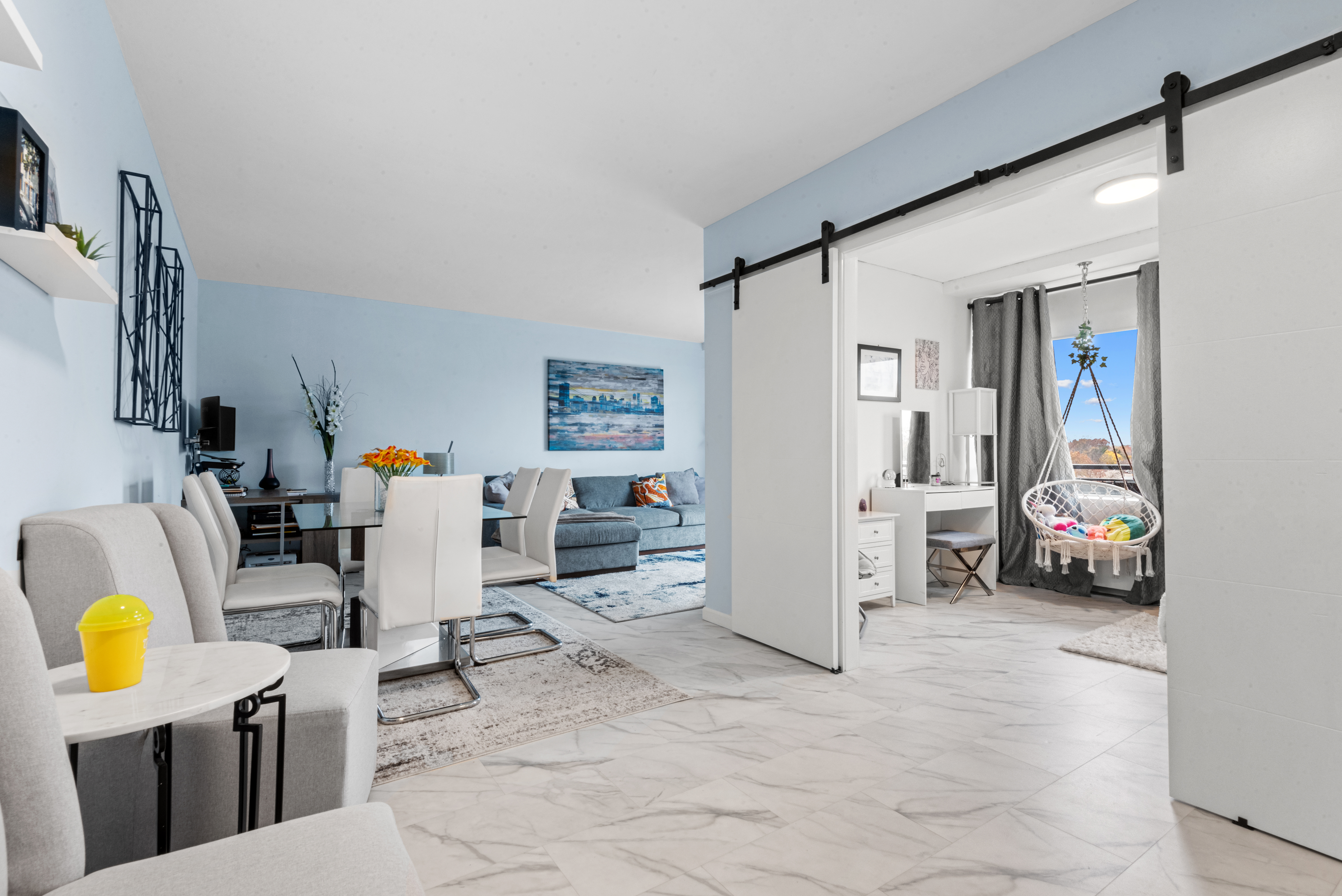4 Horizon Road, Unit 1013 Fort Lee, NJ 07024 - Photo 2 of 18 a view of living room with furniture and a flat screen tv