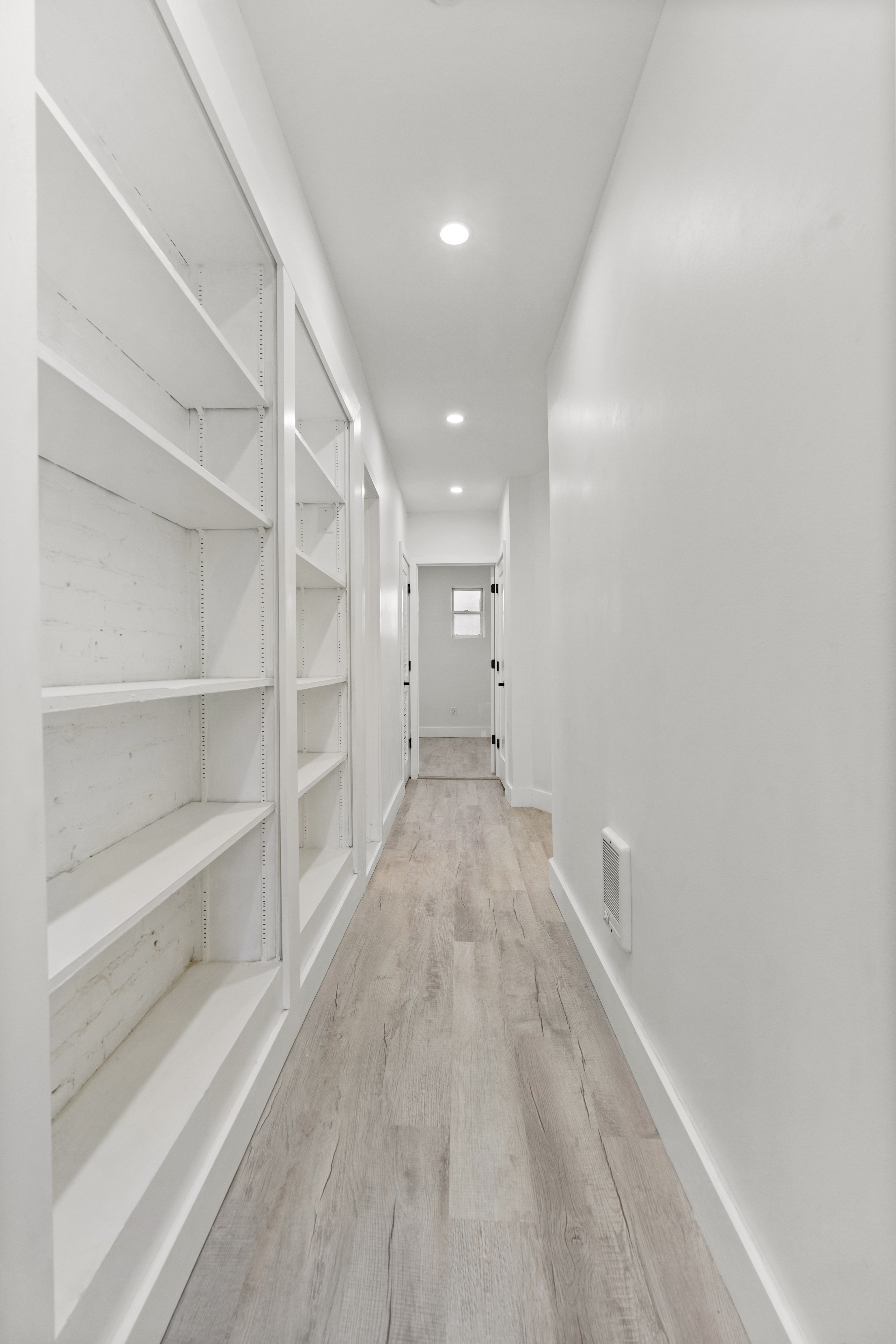 714 Greenwich Street, Unit 8 Manhattan, NY 10014 - Photo 5 of 7 a view of a big room with closet and racks