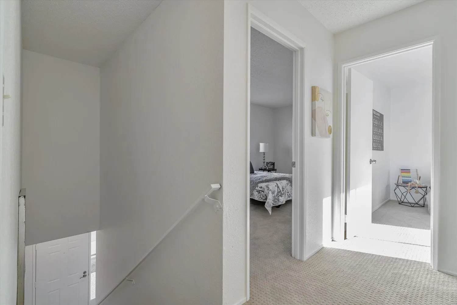 a bedroom with a bed and chair