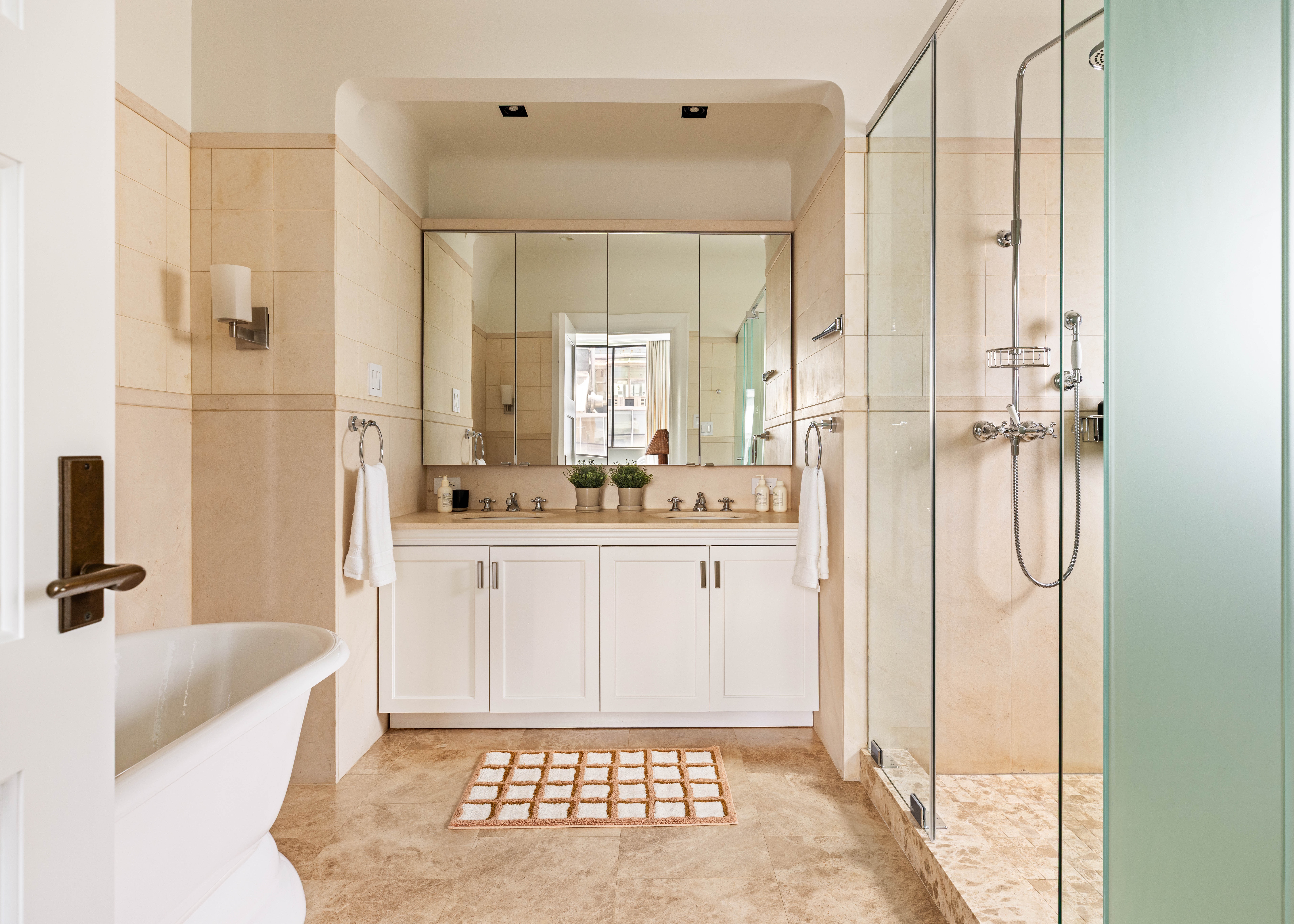 17 Bergen Street, Unit 4/PH Brooklyn, NY 11201 - Photo 8 of 21 a bathroom with a tub shower and sink