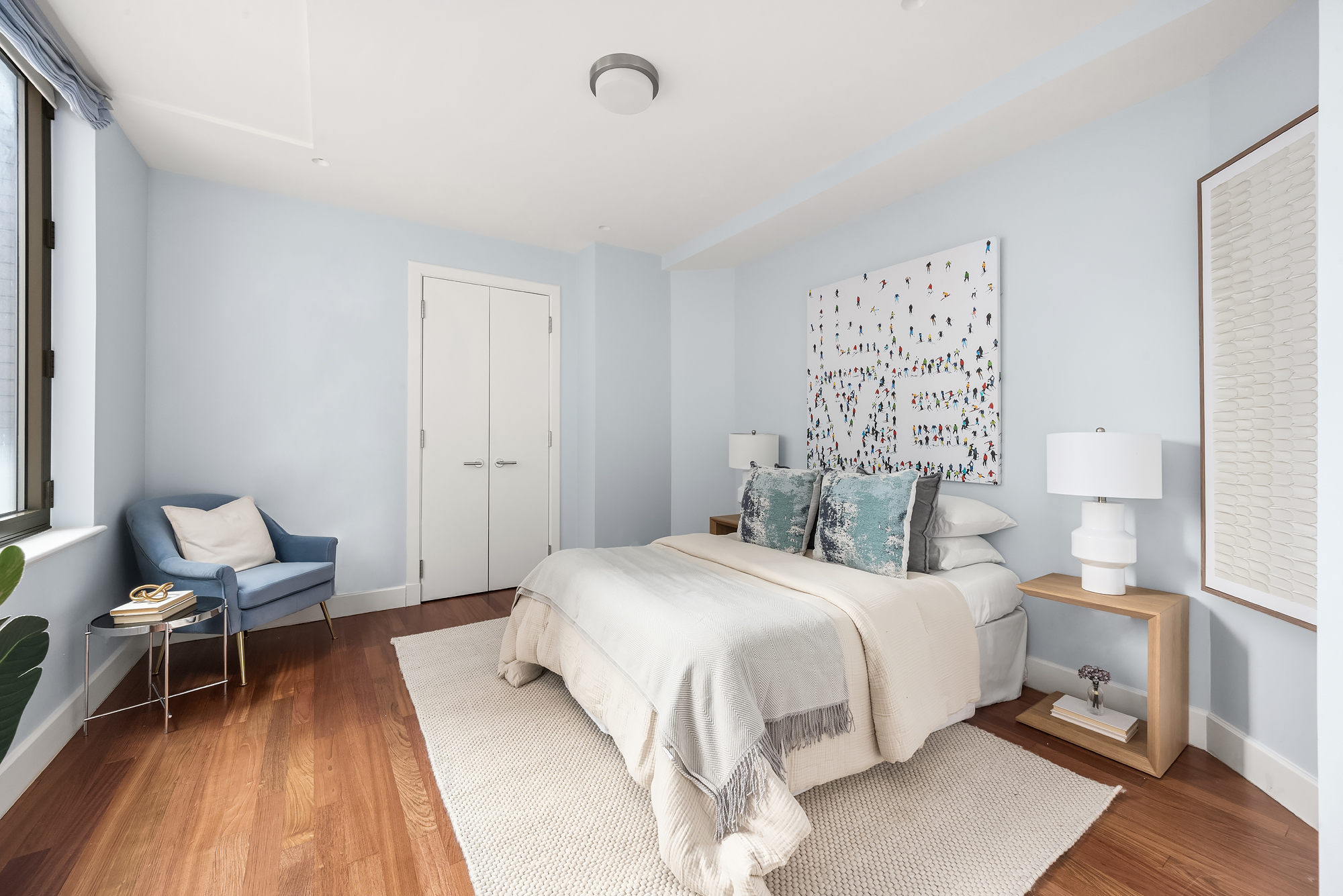 43 West 64th Street, Unit 7A Manhattan, NY 10023 - Photo 18 of 20 a bedroom with a bed and wooden floor