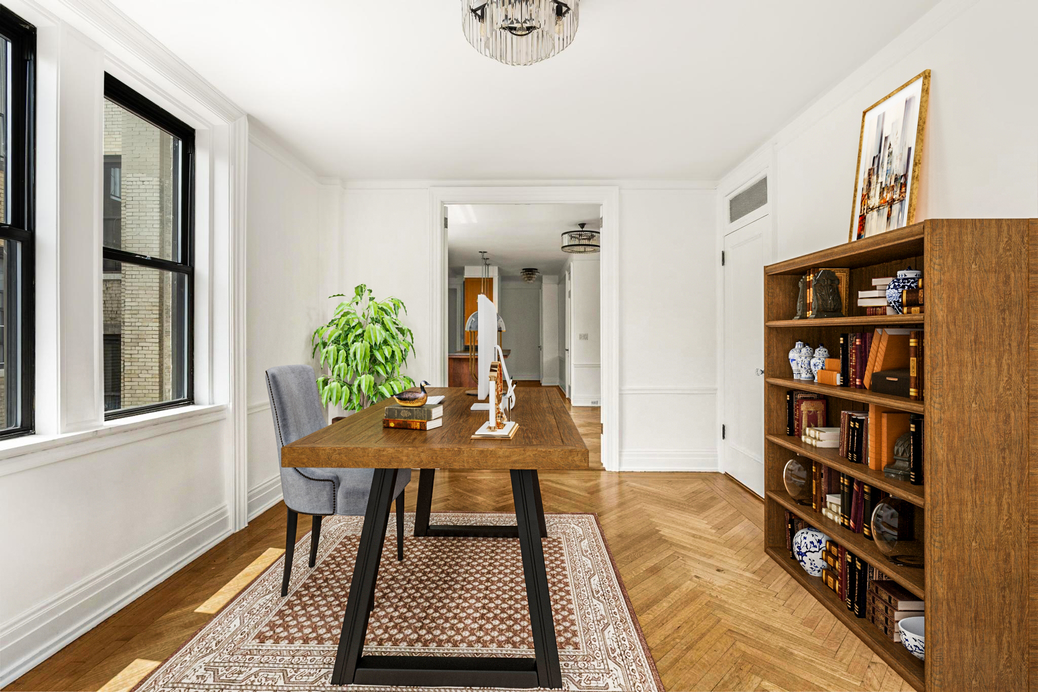885 West End Avenue, Unit 12D Manhattan, NY 10025 - Photo 5 of 24 a view of a workspace with furniture and a book shelf