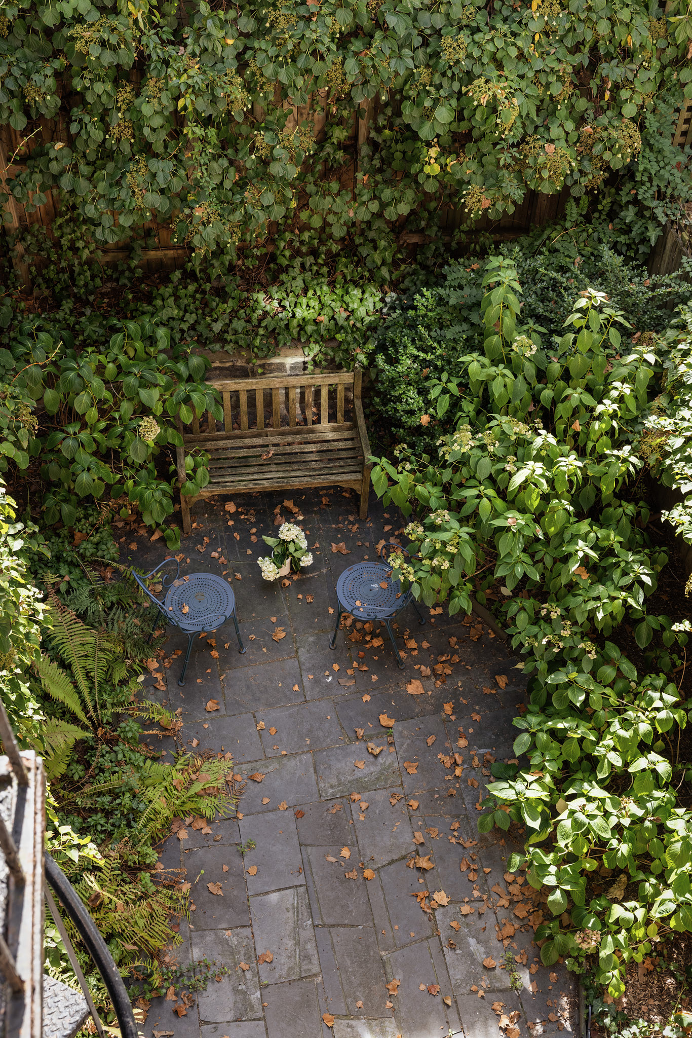 348 West 20th Street Manhattan, NY 10011 - Photo 6 of 18 a view of a yard with plants and trees