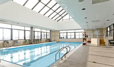 a outdoor space with lots of tables and chairs