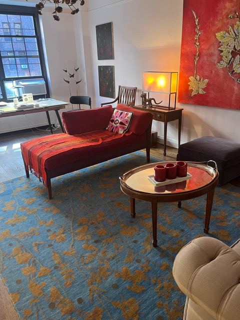 435 West 23rd Street, Unit 7B Manhattan, NY 10011 - Photo 5 of 23 a living room with furniture a window and a table