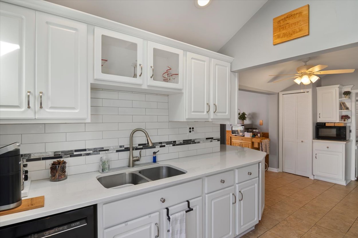 107 Kingston Road Parsippany, NJ 07054 - Photo 7 of 43 a kitchen with stainless steel appliances granite countertop a sink and cabinets