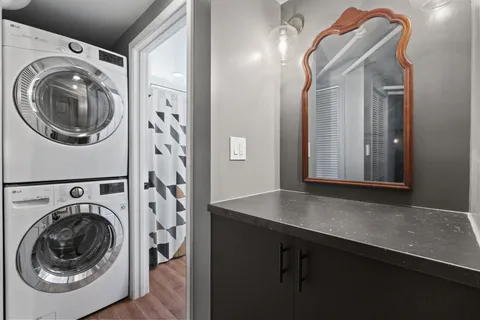a view of a hallway with washer and dryer