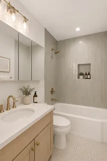 a bathroom with a sink a toilet and a bathtub