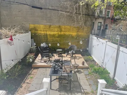 a picture of a table and chairs in patio