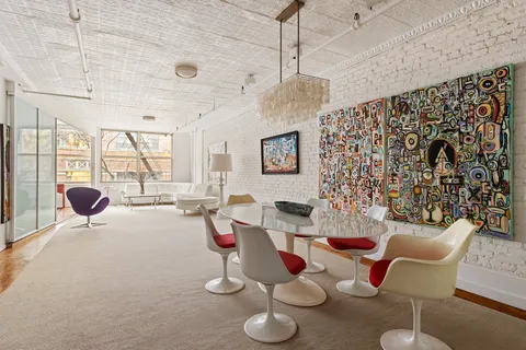 a room with furniture and window