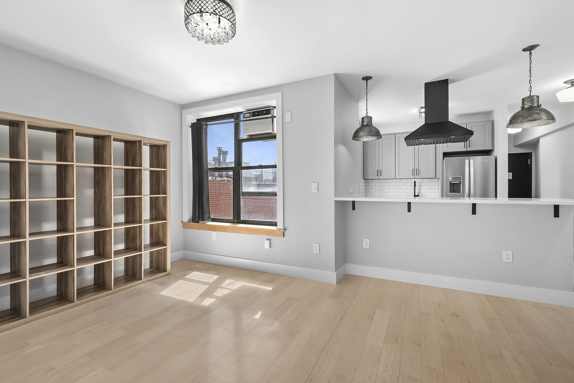 108 Division Avenue, Unit 22 Brooklyn, NY 11211 - Photo 4 of 11 a view of an empty room with a window