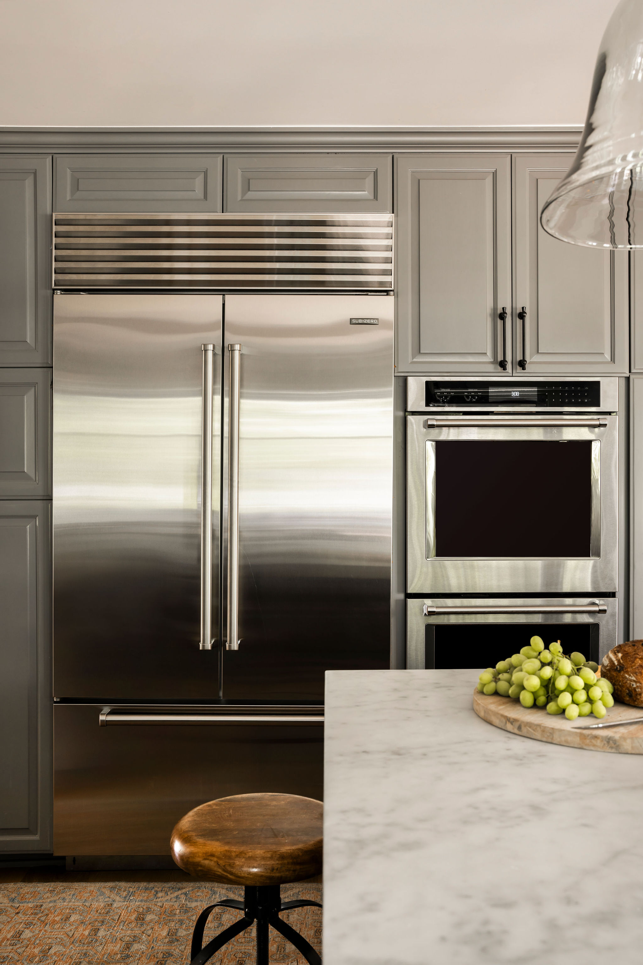 560 Cold Canyon Road Calabasas, CA 91302 - Photo 18 of 84 a kitchen with a refrigerator and a stove