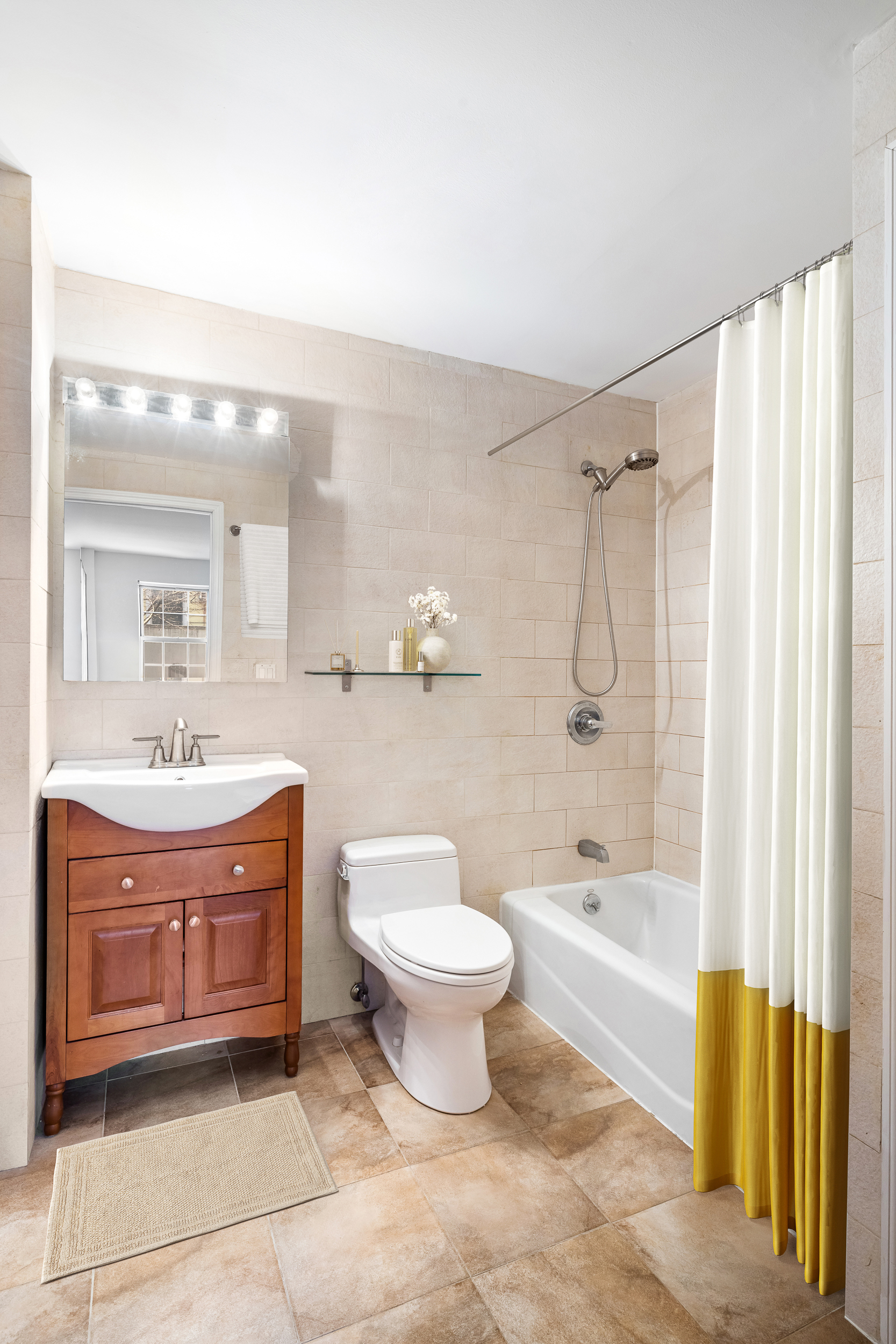 26 Monitor Street, Unit 1 Brooklyn, NY 11222 - Photo 5 of 11 a bathroom with a sink toilet and shower