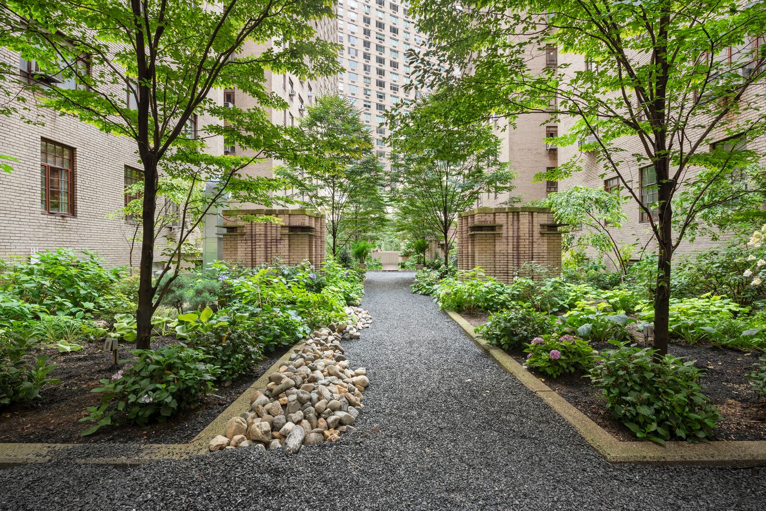 25 Central Park West, Unit 14R Manhattan, NY 10023 - Photo 20 of 22 a view of a pathway with a yard