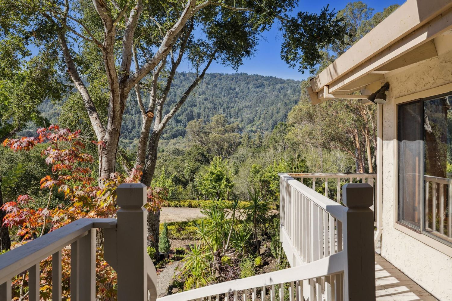 a balcony with wooden fence