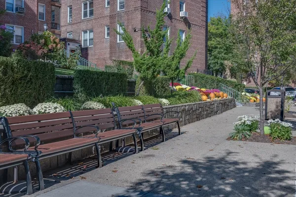 a garden view with a seating space