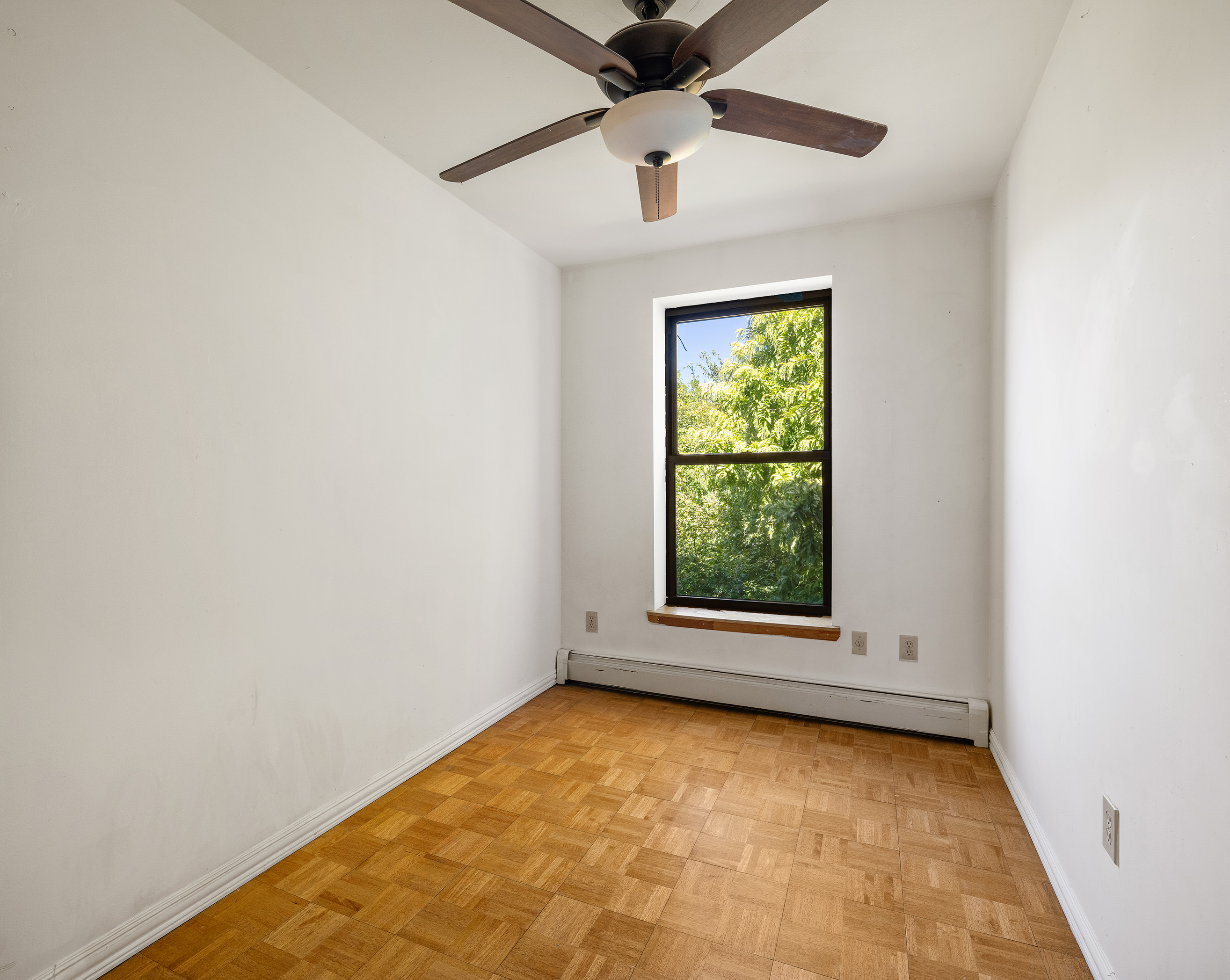 37 Quincy Street Brooklyn, NY 11238 - Photo 19 of 24 an empty room with a empty space and a window