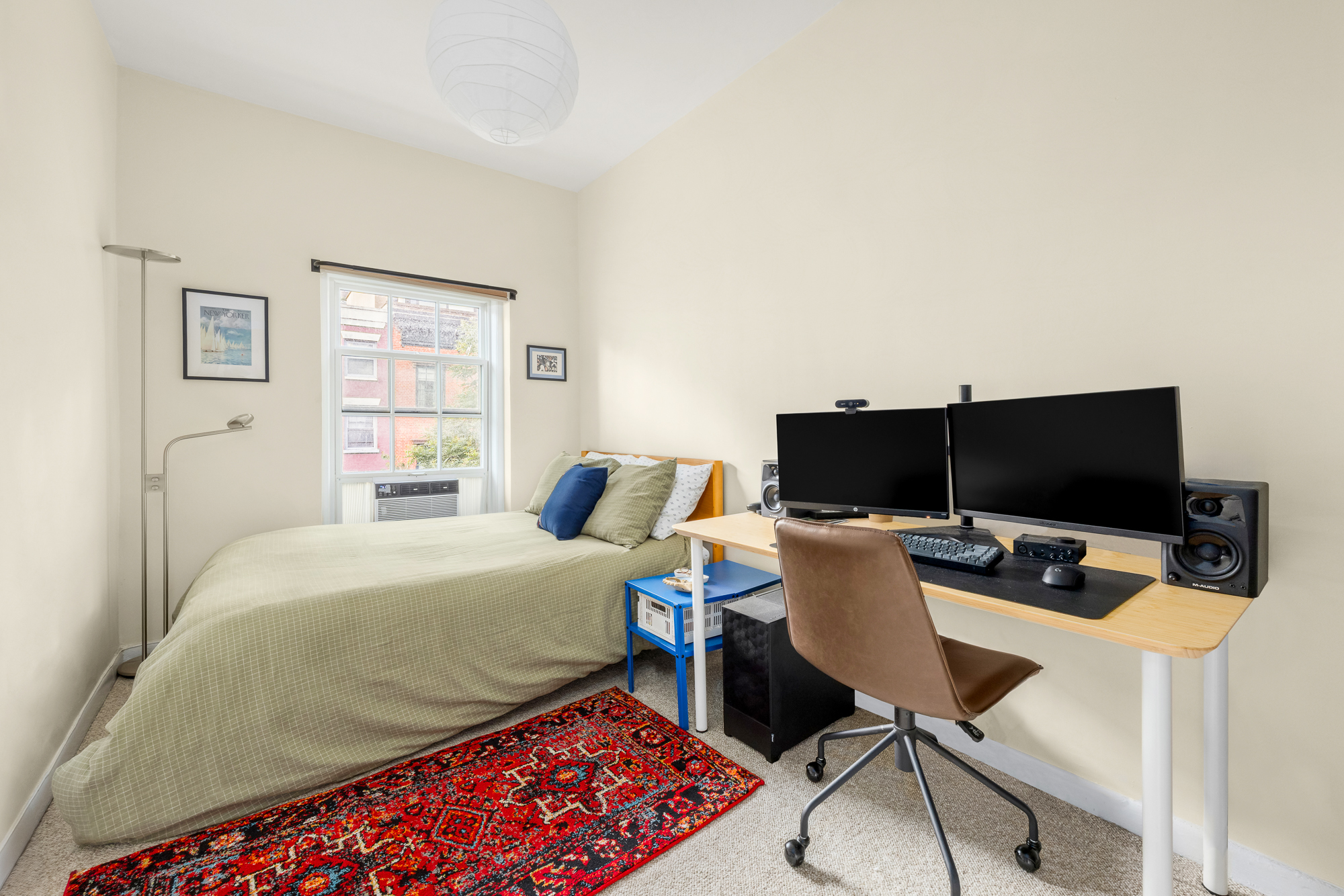 342 West 22nd Street, Unit 3 Manhattan, NY 10011 - Photo 9 of 11 a bedroom with a workspace