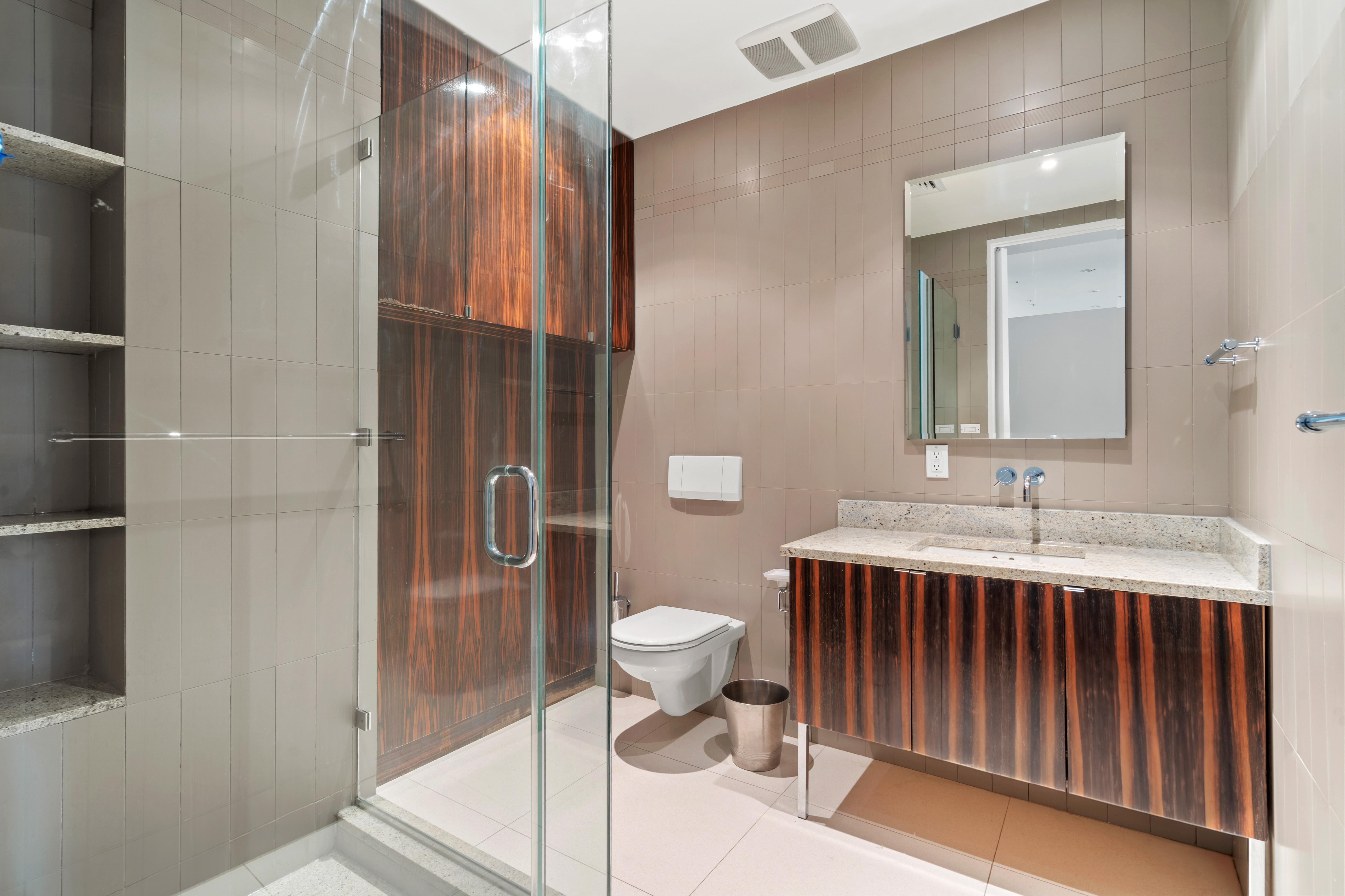 32 Laight Street, Unit 5 Manhattan, NY 10013 - Photo 28 of 31 a bathroom with a sink a toilet and shower