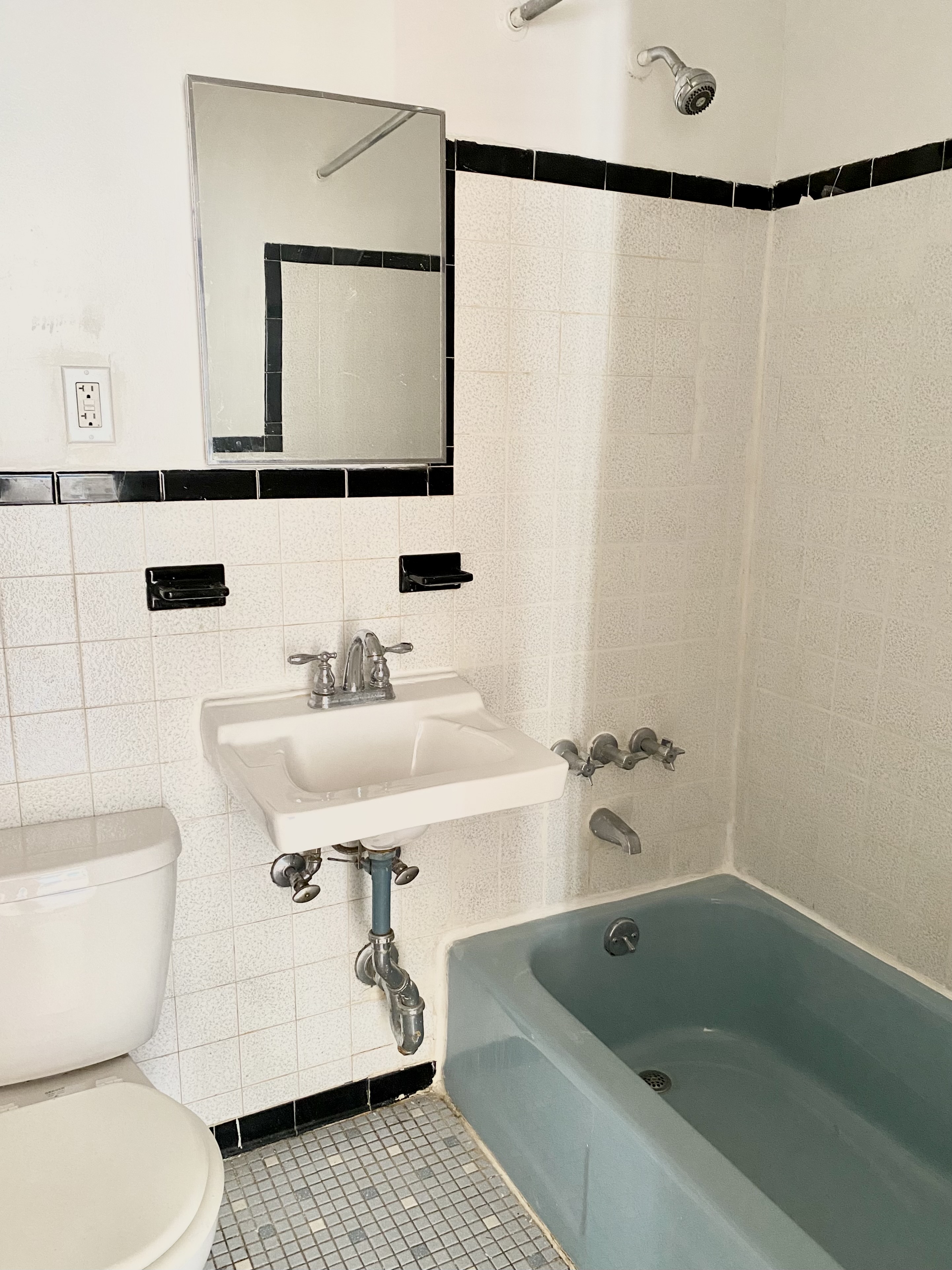 1736 2nd Avenue, Unit 3A Manhattan, NY 10128 - Photo 4 of 4 a bathroom with a sink toilet and shower