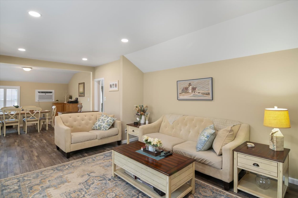 107 Kingston Road Parsippany, NJ 07054 - Photo 12 of 43 a living room with furniture and a table