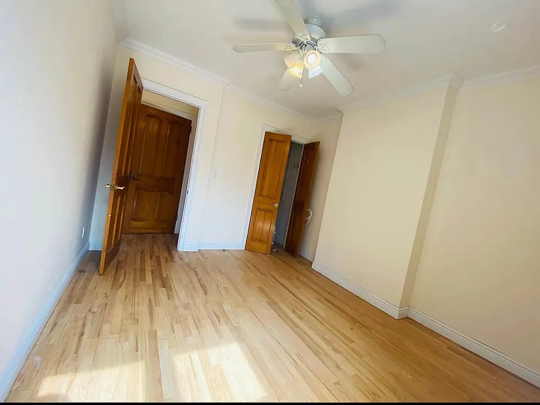 305 West 91st Street, Unit 4F Manhattan, NY 10024 - Photo 6 of 11 a view of a hallway with wooden floor
