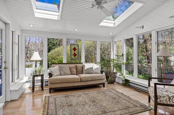 a kitchen with granite countertop a sink and cabinets