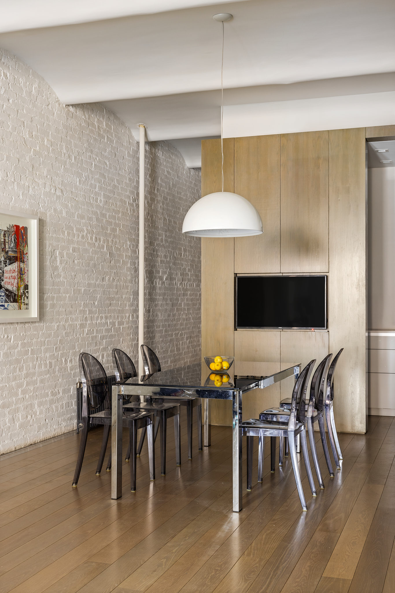 543 Broadway, Unit 6 Manhattan, NY 10012 - Photo 5 of 13 a view of a dining room with furniture and wooden floor