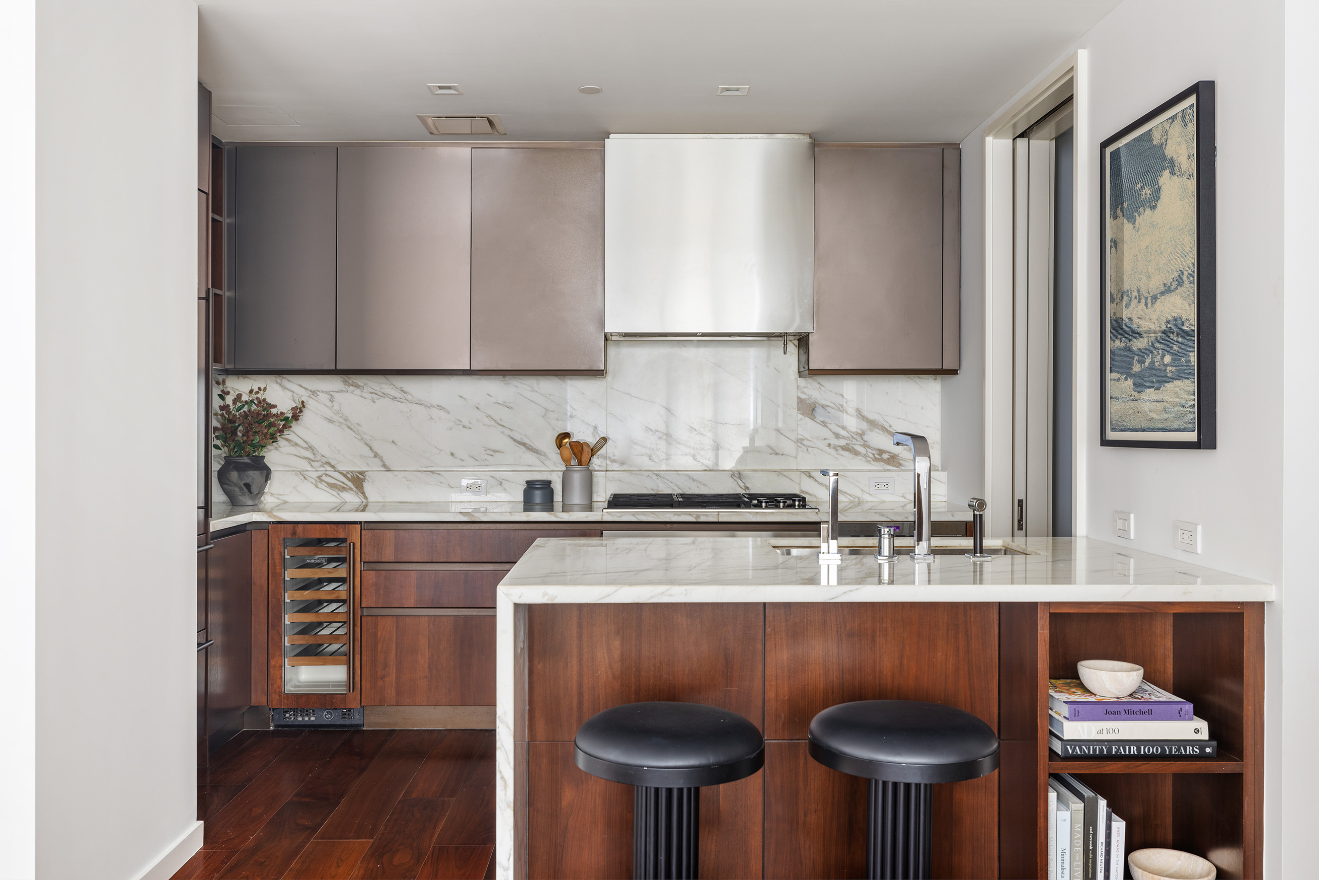 1 West End Avenue, Unit 15E Manhattan, NY 10023 - Photo 4 of 31 a kitchen with stainless steel appliances granite countertop a sink and a stove