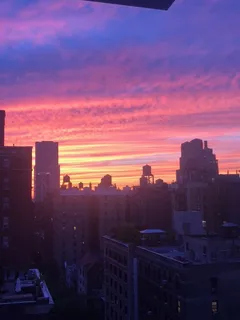 a view of a city with sunset view