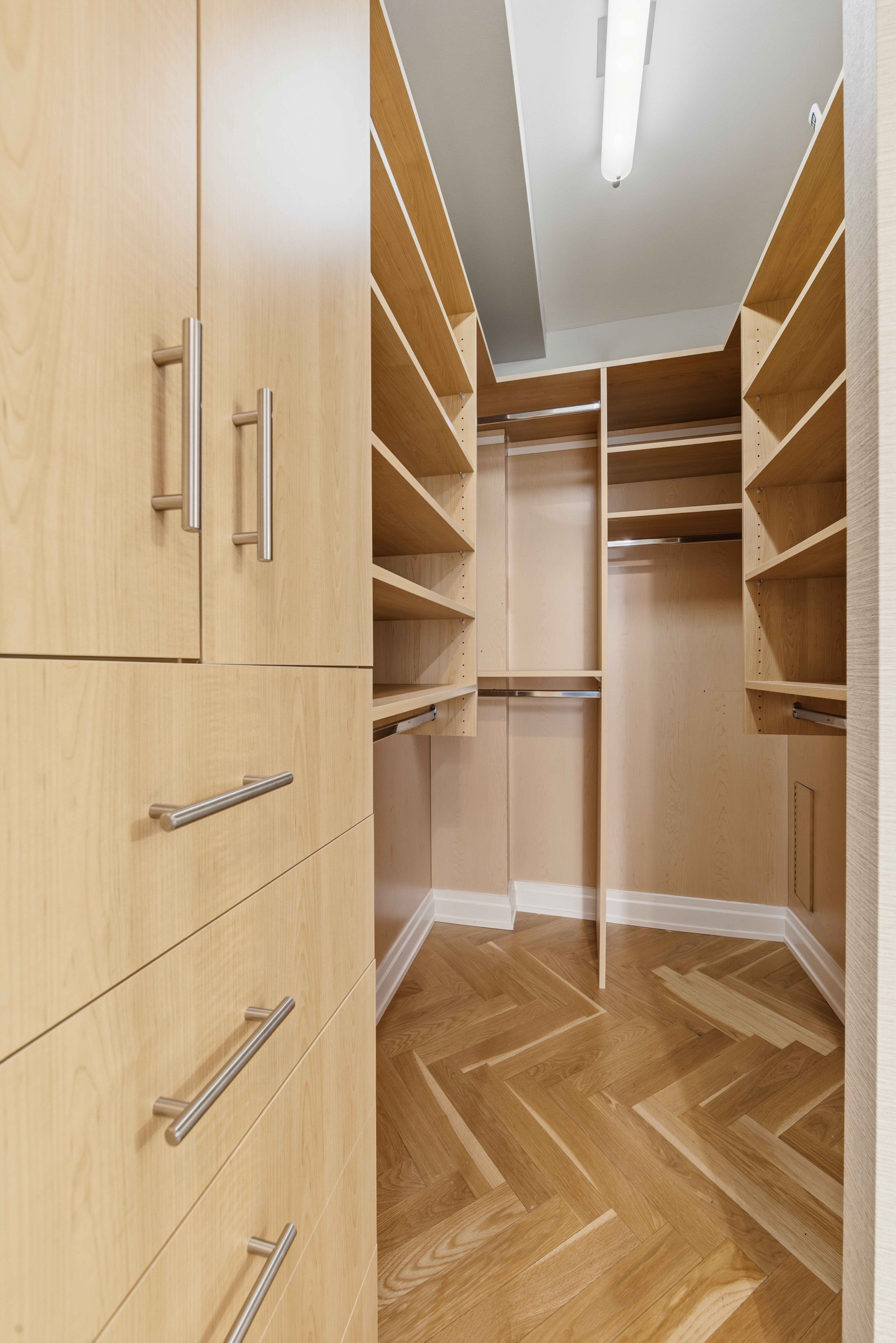 40 East 78th Street, Unit 5E Manhattan, NY 10075 - Photo 13 of 23 a room with walk in closet and empty racks