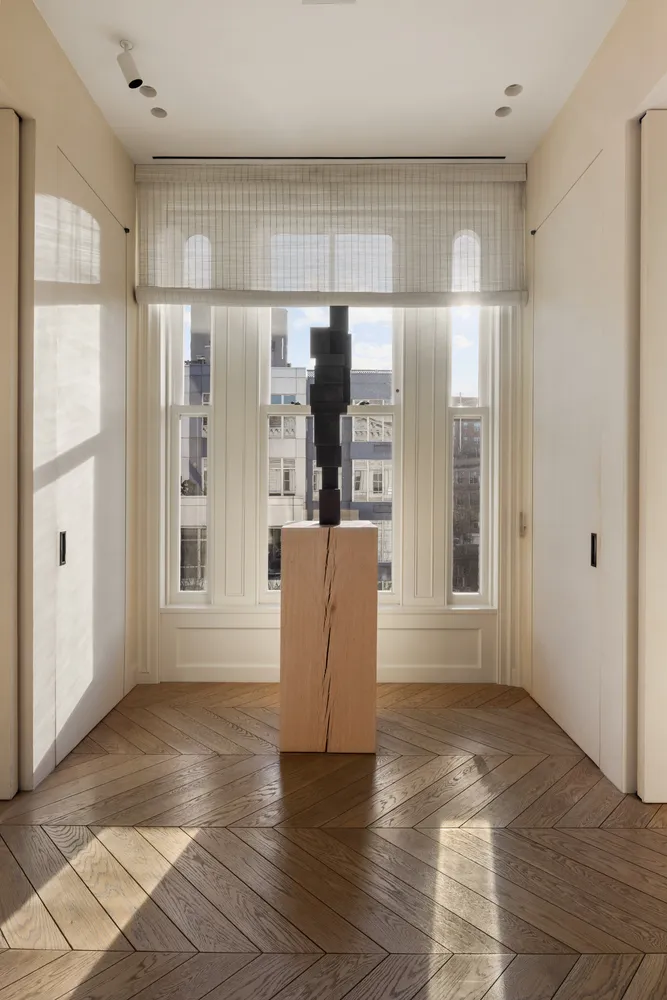 a view of kitchen with furniture and window