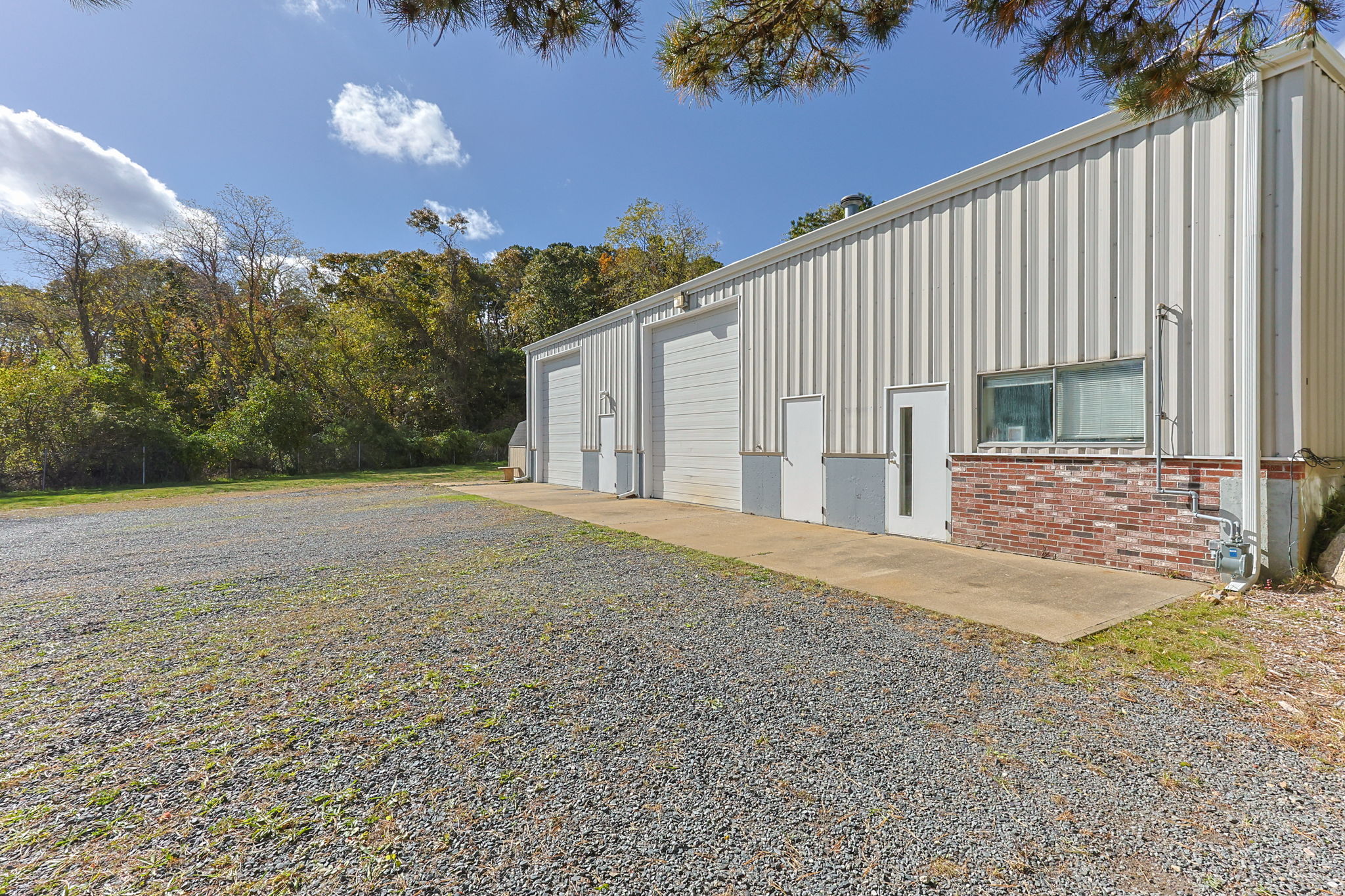9 Rayber Road Orleans, MA 02653 - Photo 4 of 31 a view of a house with backyard and tree