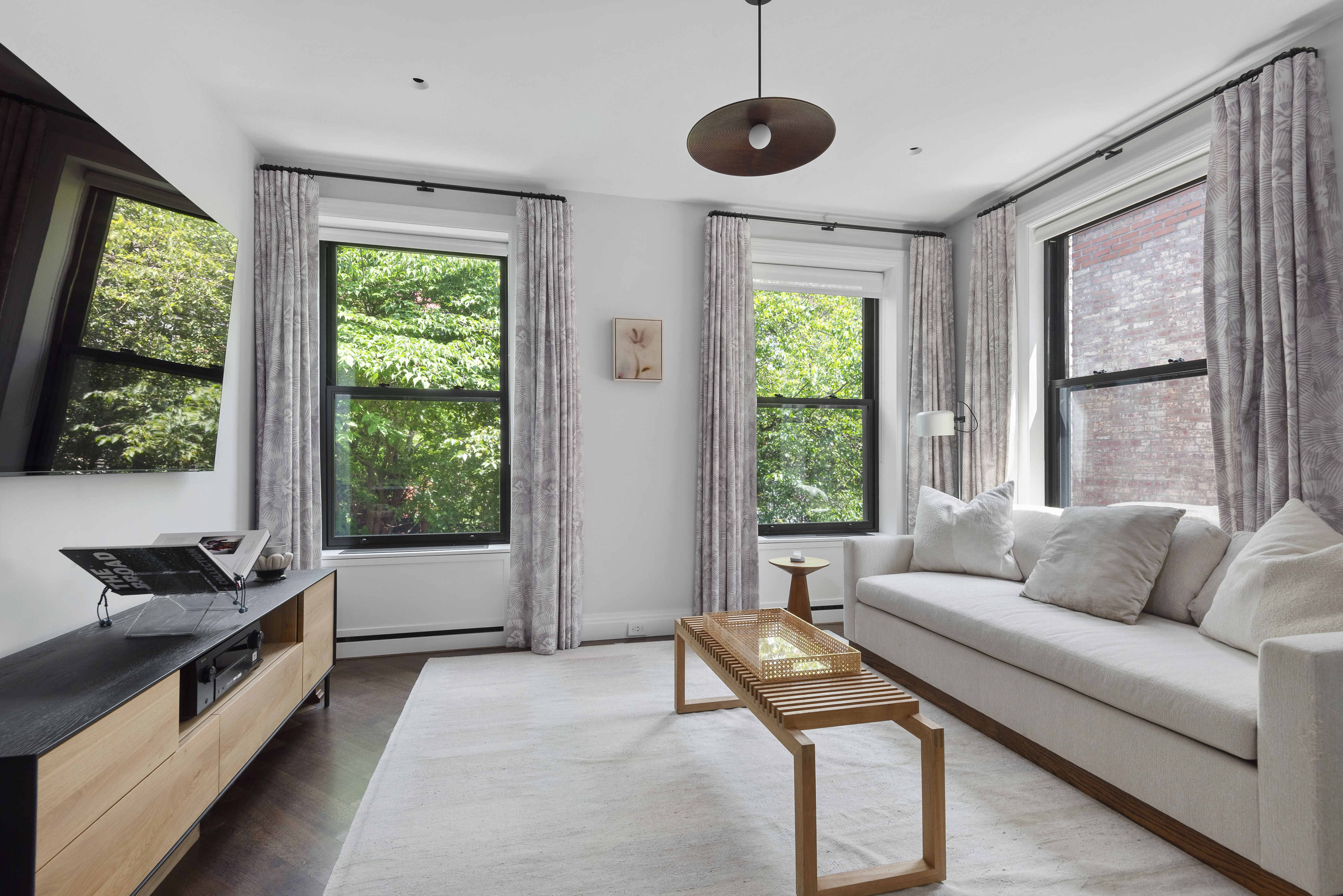 9 Garden Place, Unit 2 Brooklyn, NY 11201 - Photo 13 of 18 a living room with furniture and a window